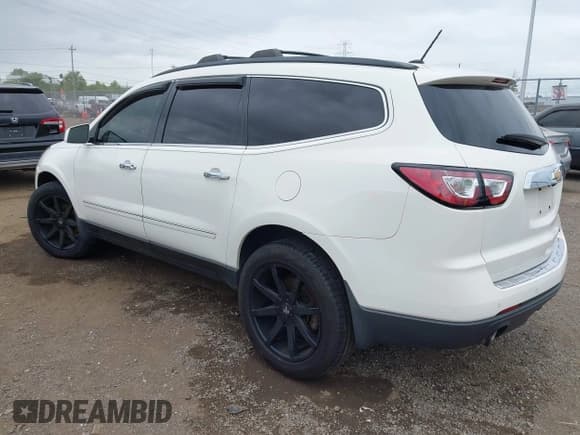 ✅ 2014 Chevrolet Traverse LTZ • VIN: 1GNKRJKD4EJ359381 • Lot: 43045392. Listed on IAAI with 186,015 mi. Free auction sales archive from the USA and detailed vehicle history report at DreamBid. Image 3.