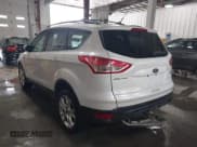 ✅ 2013 Ford Escape SE • VIN: 1FMCU0GX9DUD77960 • Lot: 41498045. Listed on IAAI with 152,730 mi. Free auction sales archive from the USA and detailed vehicle history report at DreamBid. Image 3.