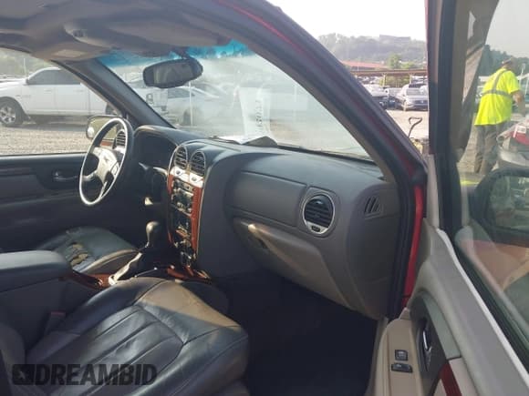 ✅ 2002 GMC Envoy SLE • VIN: 1GKDS13S222326800 • Лот: 42402071. Опубликован ранее на IAAI с пробегом 256 125 миль. Бесплатный доступ к архиву аукционных продаж из США и подробный отчёт об истории автомобиля на DreamBid. Изображение 5.