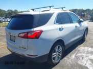 ✅ 2018 Chevrolet Equinox Premier • VIN: 2GNAXVEV0J6125484 • Лот: 43473330. Опубликован ранее на IAAI с пробегом 125 692 миль. Бесплатный доступ к архиву аукционных продаж из США и подробный отчёт об истории автомобиля на DreamBid. Изображение 4.