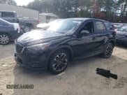 ✅ 2016 Mazda CX-5 Grand Touring • VIN: JM3KE4DY9G0764433 • Lot: 82728825. Wystawiony na Copart z przebiegiem 166 905 mil. Bezpłatny archiwum sprzedaży aukcyjnych z USA i szczegółowy raport historii pojazdu na DreamBid. Zdjęcie 1.