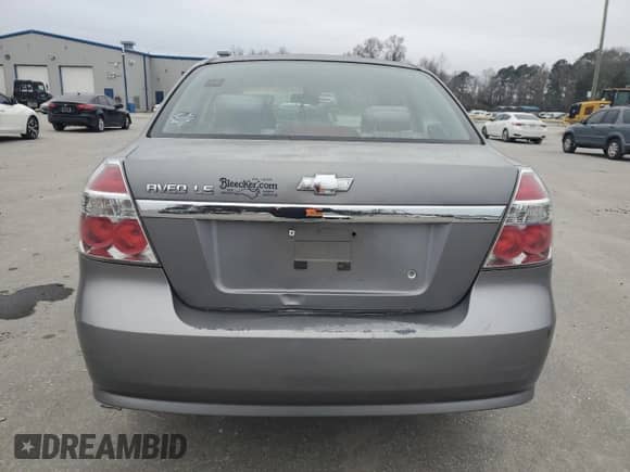 2007 Chevrolet Aveo LS z VIN KL1TD56637B061892, wystawiony jako Copart lot #86140044 z przebiegiem Nie podano mil oraz Szkoda całkowita • Salvage title. Historia ofert i sprzedaży dostępna na DreamBid. Obrazek 6.