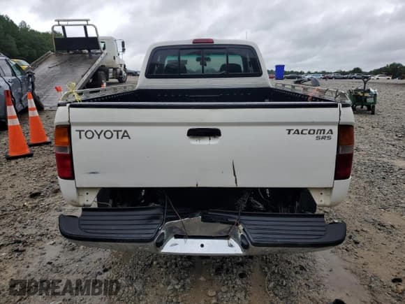 ✅ 1999 Toyota Tacoma • VIN: 4TAVL52N3XZ523937 • Lot: 66933295. Listed on Copart with 284,029 mi. Free auction sales archive from the USA and detailed vehicle history report at DreamBid. Image 6.