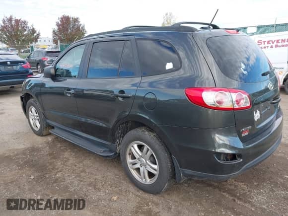 2010 Hyundai Santa Fe GLS with VIN 5NMSGDAB2AH404379, listed as a IAAI auction lot 43495579 with 164,073 mi miles and . Bid and sale history available at DreamBid. Image 3.