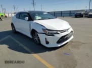 ✅ 2014 Scion tC • VIN: JTKJF5C77E3069999 • Лот: 69313125. Опубликован ранее на Copart с пробегом 77 283 миль. Бесплатный доступ к архиву аукционных продаж из США и подробный отчёт об истории автомобиля на DreamBid. Изображение 13.