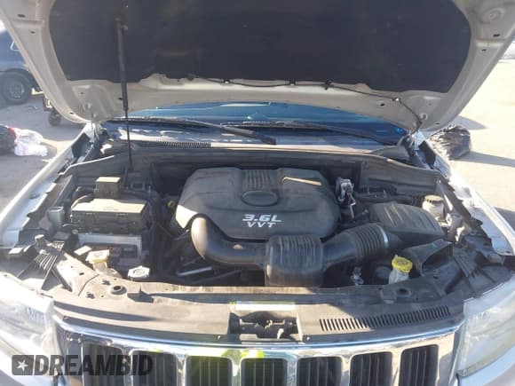 ✅ 2012 Jeep Grand Cherokee Limited • VIN: 1C4RJEBG2CC201946 • Lot: 43619083. Listed on IAAI with 168,571 mi. Free auction sales archive from the USA and detailed vehicle history report at DreamBid. Image 10.