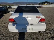 ✅ 2003 Mitsubishi Lancer ES • VIN: JA3AJ26E63U000905 • Lot: 82714615. Wystawiony na Copart z przebiegiem 116 760 mil. Bezpłatny archiwum sprzedaży aukcyjnych z USA i szczegółowy raport historii pojazdu na DreamBid. Zdjęcie 6.