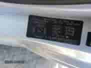 2010 Hyundai Accent L with VIN KMHCN3BCXAU182917, listed as a Copart auction lot 69464685 with 124,678 mi miles and Salvage title. Bid and sale history available at DreamBid. Image 12.