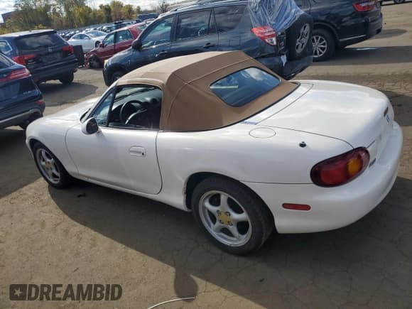 ✅ 1999 Mazda MX-5 Miata • VIN: JM1NB3539X0136190 • Lot: 82707195. Listed on Copart with 109,300 mi. Free auction sales archive from the USA and detailed vehicle history report at DreamBid. Image 2.