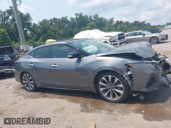 ✅ 2022 Nissan Maxima Platinum • VIN: 1N4AA6FV9NC504386 • Lot: 42917454. Listed on IAAI with 60,504 mi. Free auction sales archive from the USA and detailed vehicle history report at DreamBid. Image 12.