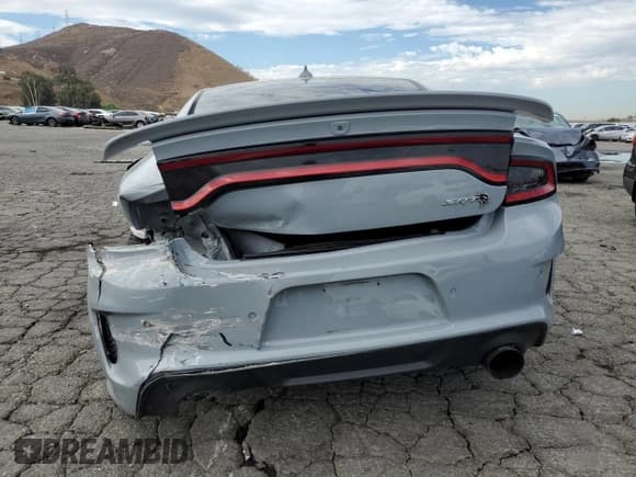 ✅ 2022 Dodge Charger SRT Hellcat Widebody • VIN: 2C3CDXL91NH100717 • Лот: 82333965. Опубликован ранее на Copart с пробегом 33 982 миль. Бесплатный доступ к архиву аукционных продаж из США и подробный отчёт об истории автомобиля на DreamBid. Изображение 6.