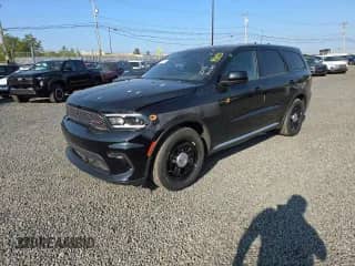 2024 Dodge Durango Pursuit with VIN 1C4SDJFT1RC234339, listed as a Copart auction lot 90801555 with 1,018 mi miles and Salvage title. Bid and sale history available at DreamBid. Image 1.