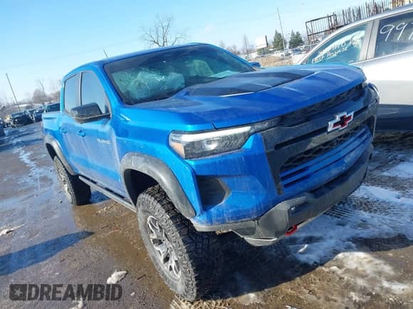 2023 Chevrolet Colorado 4WD ZR2 с VIN 1GCPTFEK2P1247799, выставлен на аукционе IAAI как лот 41332156 с пробегом 12 259 миль миль и . История ставок и продаж доступна на DreamBid. Изображение 1.