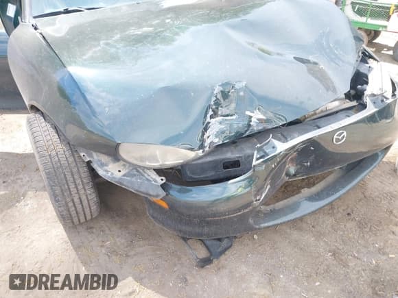 ✅ 1999 Mazda MX-5 Miata • VIN: JM1NB3531X0105029 • Lot: 42083930. Listed on IAAI with 186,885 mi. Free auction sales archive from the USA and detailed vehicle history report at DreamBid. Image 6.