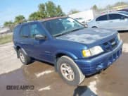 ✅ 2004 Isuzu Rodeo S • VIN: 4S2CK58W944317209 • Lot: 41498160. Listed on IAAI with 114,764 mi. Free auction sales archive from the USA and detailed vehicle history report at DreamBid. Image 1.
