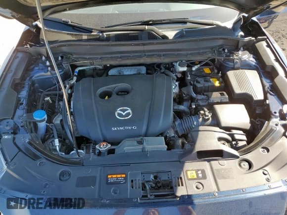 ✅ 2023 Mazda CX-5 S Preferred • VIN: JM3KFBCM8P0169606 • Lot: 85891735. Listed on Copart with 70,494 mi. Free auction sales archive from the USA and detailed vehicle history report at DreamBid. Image 12.