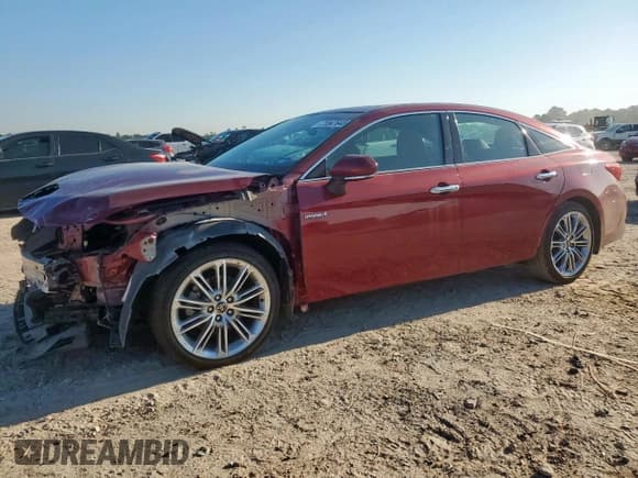 ✅ 2021 Toyota Avalon Limited Hybrid • VIN: 4T1DA1AB5MU007962 • Lot: 71047645. Listed on Copart with 52,694 mi. Free auction sales archive from the USA and detailed vehicle history report at DreamBid. Image 1.