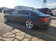 ✅ 2011 BMW 7 Series 750Li • VIN: WBAKB8C55BCY66557 • Lot: 71077225. Listed on Copart with 197,737 mi. Free auction sales archive from the USA and detailed vehicle history report at DreamBid. Image 2.