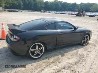 2008 Hyundai Tiburon GT с VIN KMHHN66F88U289728, выставлен на аукционе Copart как лот 62371395 с пробегом 153 660 миль миль и Чистый • Clean title. История ставок и продаж доступна на DreamBid. Изображение 3.