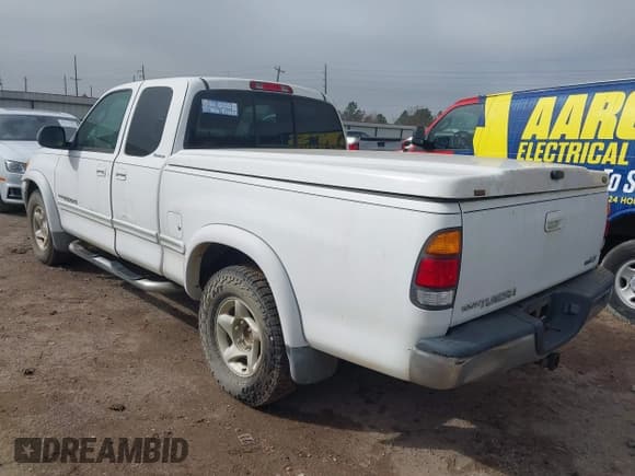✅ 2001 Toyota Tundra Limited • VIN: 5TBRT38101S165213 • Lot: 41640261. Listed on IAAI with 203,021 mi. Free auction sales archive from the USA and detailed vehicle history report at DreamBid. Image 3.