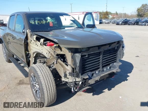 ✅ 2023 GMC Canyon 4WD AT4 • VIN: 1GTP6DEK1P1174713 • Lot: 41733242. Listed on IAAI with 35,705 mi. Free auction sales archive from the USA and detailed vehicle history report at DreamBid. Image 6.