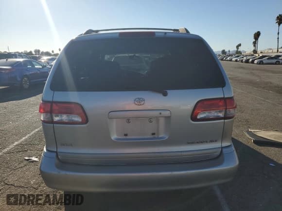 ✅ 2002 Toyota Sienna LE • VIN: 4T3ZF13C52U505287 • Lot: 77164884. Listed on Copart with Not provided. Free auction sales archive from the USA and detailed vehicle history report at DreamBid. Image 6.