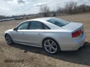 ✅ 2013 Audi S8 • VIN: WAUD2AFD1DN010425 • Лот: 50203305. Опубликован ранее на Copart с пробегом 108 677 миль. Бесплатный доступ к архиву аукционных продаж из США и подробный отчёт об истории автомобиля на DreamBid. Изображение 2.