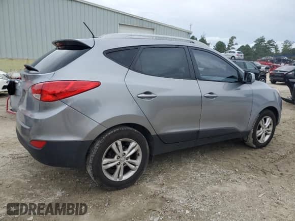 2011 Hyundai Tucson GLS z VIN KM8JU3AC1BU275337, wystawiony jako Copart lot #72953794 z przebiegiem 255 917 mil mil oraz Szkoda całkowita • Salvage title. Historia ofert i sprzedaży dostępna na DreamBid. Obrazek 3.