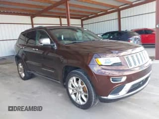 ✅ 2015 Jeep Grand Cherokee Summit • VIN: 1C4RJEJG2FC829205 • Lot: 43469676. Listed on IAAI with 89,893 mi. Free auction sales archive from the USA and detailed vehicle history report at DreamBid. Image 1.