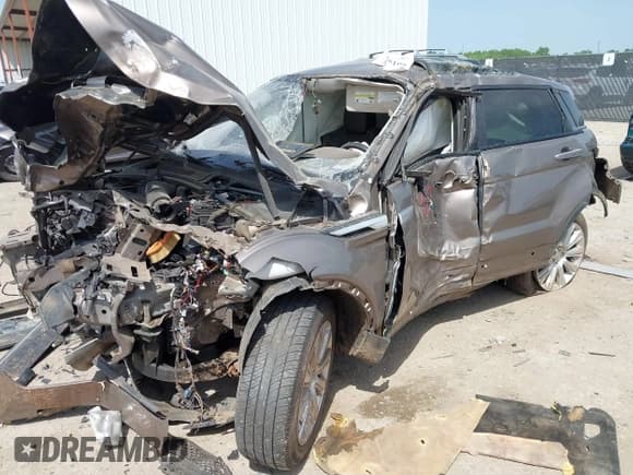 ✅ 2015 Land Rover Range Rover Evoque Prestige • VIN: SALVV2BG5FH001029 • Lot: 42015106. Listed on IAAI with Not provided. Free auction sales archive from the USA and detailed vehicle history report at DreamBid. Image 16.