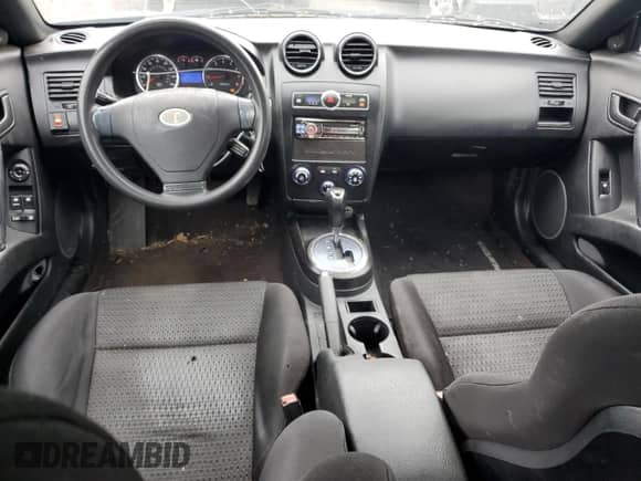 2008 Hyundai Tiburon GS с VIN KMHHM66D08U266025, выставлен на аукционе Copart как лот 59875935 с пробегом 161 271 миль миль и Списание • Salvage title. История ставок и продаж доступна на DreamBid. Изображение 8.