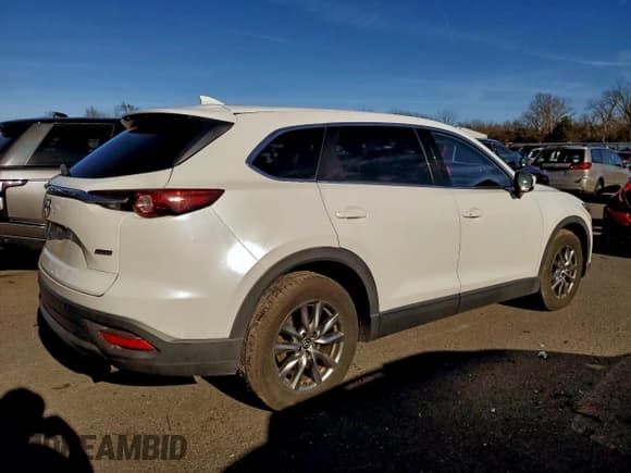 ✅ 2018 Mazda CX-9 Touring • VIN: JM3TCBCY2J0207175 • Лот: 93869375. Опубликован ранее на Copart с пробегом 127 996 миль. Бесплатный доступ к архиву аукционных продаж из США и подробный отчёт об истории автомобиля на DreamBid. Изображение 3.