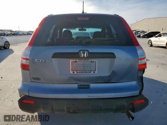 ✅ 2009 Honda CR-V LX • VIN: 5J6RE38309L035796 • Лот: 92192685. Опубликован ранее на Copart с пробегом 189 424 миль. Бесплатный доступ к архиву аукционных продаж из США и подробный отчёт об истории автомобиля на DreamBid. Изображение 6.