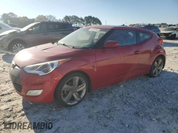 2012 Hyundai Veloster w/Red Int z VIN KMHTC6AD9CU084434, wystawiony jako Copart lot #83387244 z przebiegiem 177 841 mil mil oraz Czysty tytuł • Clean title. Historia ofert i sprzedaży dostępna na DreamBid. Obrazek 1.