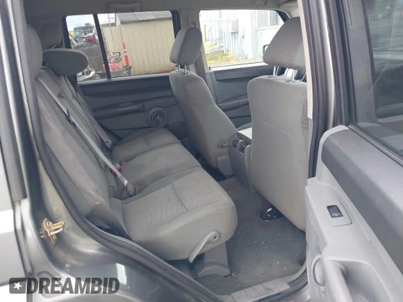 ✅ 2007 Jeep Commander Sport • VIN: 1J8HG48P27C589142 • Lot: 42379721. Listed on IAAI with 162,397 mi. Free auction sales archive from the USA and detailed vehicle history report at DreamBid. Image 8.