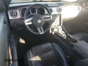 ✅ 2009 Ford Mustang • VIN: 1ZVHT80N695131676 • Lot: 91940585. Listed on Copart with 185,033 mi. Free auction sales archive from the USA and detailed vehicle history report at DreamBid. Image 8.