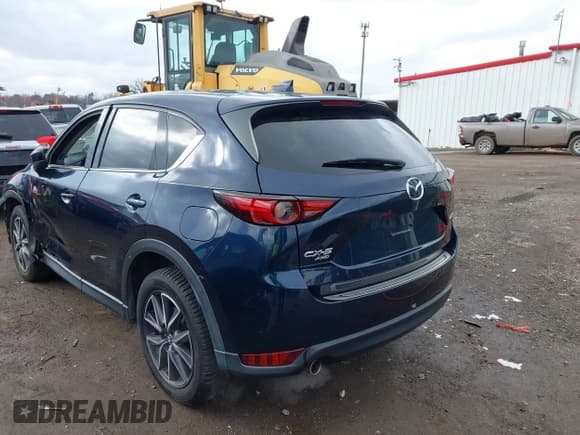 ✅ 2018 Mazda CX-5 Grand Touring • VIN: JM3KFBDM5J0426677 • Lot: 43579829. Listed on IAAI with 94,077 mi. Free auction sales archive from the USA and detailed vehicle history report at DreamBid. Image 16.
