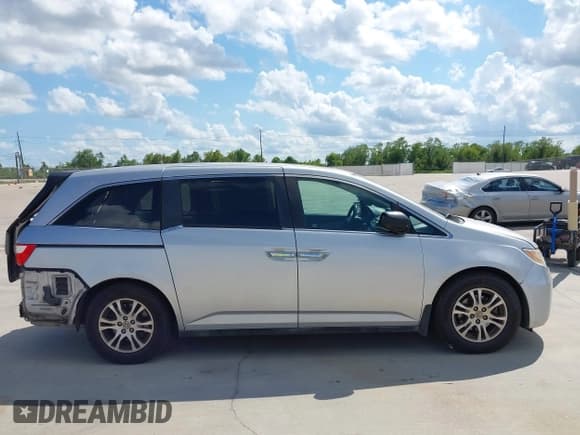 ✅ 2012 Honda Odyssey EX-L • VIN: 5FNRL5H67CB060884 • Lot: 43245657. Wystawiony na IAAI z przebiegiem 145 552 mil. Bezpłatny archiwum sprzedaży aukcyjnych z USA i szczegółowy raport historii pojazdu na DreamBid. Zdjęcie 13.