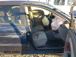 ✅ 2003 Toyota Corolla CE • VIN: JTDBR32E332004982 • Lot: 43476570. Listed on IAAI with 299,999 mi. Free auction sales archive from the USA and detailed vehicle history report at DreamBid. Image 5.