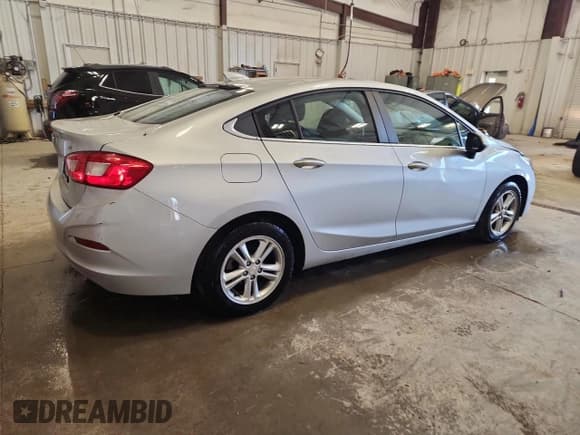 ✅ 2016 Chevrolet Cruze LT • VIN: 1G1BE5SM1G7291710 • Lot: 87075175. Listed on Copart with 102,503 mi. Free auction sales archive from the USA and detailed vehicle history report at DreamBid. Image 3.