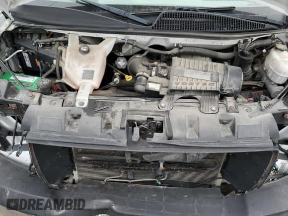 ✅ 2019 GMC Savana Cargo • VIN: 1GTW7AFG8K1272311 • Lot: 87918855. Listed on Copart with 141,396 mi. Free auction sales archive from the USA and detailed vehicle history report at DreamBid. Image 12.