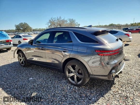 ✅ 2023 Genesis GV70 2.5T • VIN: KMUMADTB7PU100406 • Lot: 92157065. Listed on Copart with 39,810 mi. Free auction sales archive from the USA and detailed vehicle history report at DreamBid. Image 2.
