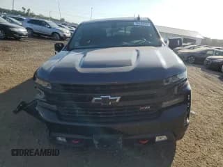 ✅ 2021 Chevrolet Silverado 1500 LT Trail Boss • VIN: 3GCPYFED8MG315183 • Lot: 70418424. Wystawiony na Copart z przebiegiem 77 205 mil. Bezpłatny archiwum sprzedaży aukcyjnych z USA i szczegółowy raport historii pojazdu na DreamBid. Zdjęcie 5.