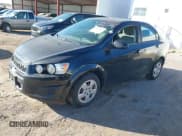 ✅ 2014 Chevrolet Sonic LS • VIN: 1G1JA5SH0E4214903 • Lot: 43633449. Listed on IAAI with 68,732 mi. Free auction sales archive from the USA and detailed vehicle history report at DreamBid. Image 2.