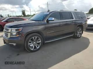 2015 Chevrolet Suburban LTZ z VIN 1GNSKKKC7FR637565, wystawiony jako Copart lot #86607825 z przebiegiem 77 675 mil mil oraz Czysty tytuł • Clean title. Historia ofert i sprzedaży dostępna na DreamBid. Obrazek 1.