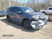 ✅ 2022 Honda Pilot Touring 7-Passenger • VIN: 5FNYF6H61NB504935 • Lot: 51186805. Listed on Copart with 99,373 mi. Free auction sales archive from the USA and detailed vehicle history report at DreamBid. Image 4.