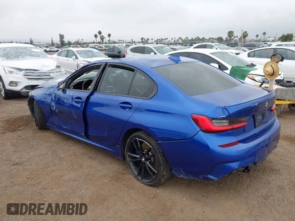 2021 BMW 3 Series M340i with VIN 3MW5U7J05M8B55489, listed as a IAAI auction lot 42440059 with 72,389 mi miles and . Bid and sale history available at DreamBid. Image 3.
