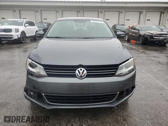 ✅ 2013 Volkswagen Jetta TDI w/Premium/Nav • VIN: 3VWLL7AJ8DM242815 • Lot: 85527915. Listed on Copart with 151,459 mi. Free auction sales archive from the USA and detailed vehicle history report at DreamBid. Image 5.