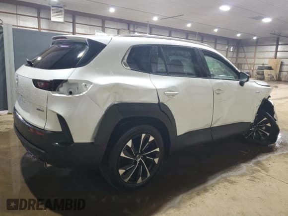 ✅ 2025 Mazda CX-50 Hybrid Premium Plus Package • VIN: 7MMVAAEW9SN131813 • Лот: 89638745. Опубликован ранее на Copart с пробегом Не указан. Бесплатный доступ к архиву аукционных продаж из США и подробный отчёт об истории автомобиля на DreamBid. Изображение 3.