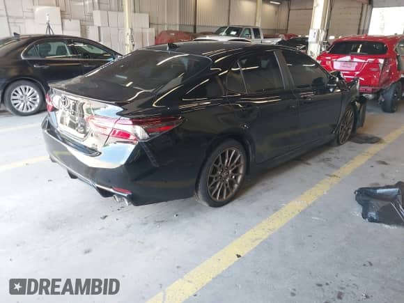2023 Toyota Camry SE with VIN 4T1G11BK4PU088615, listed as a IAAI auction lot 42345340 with 35,468 mi miles and . Bid and sale history available at DreamBid. Image 4.